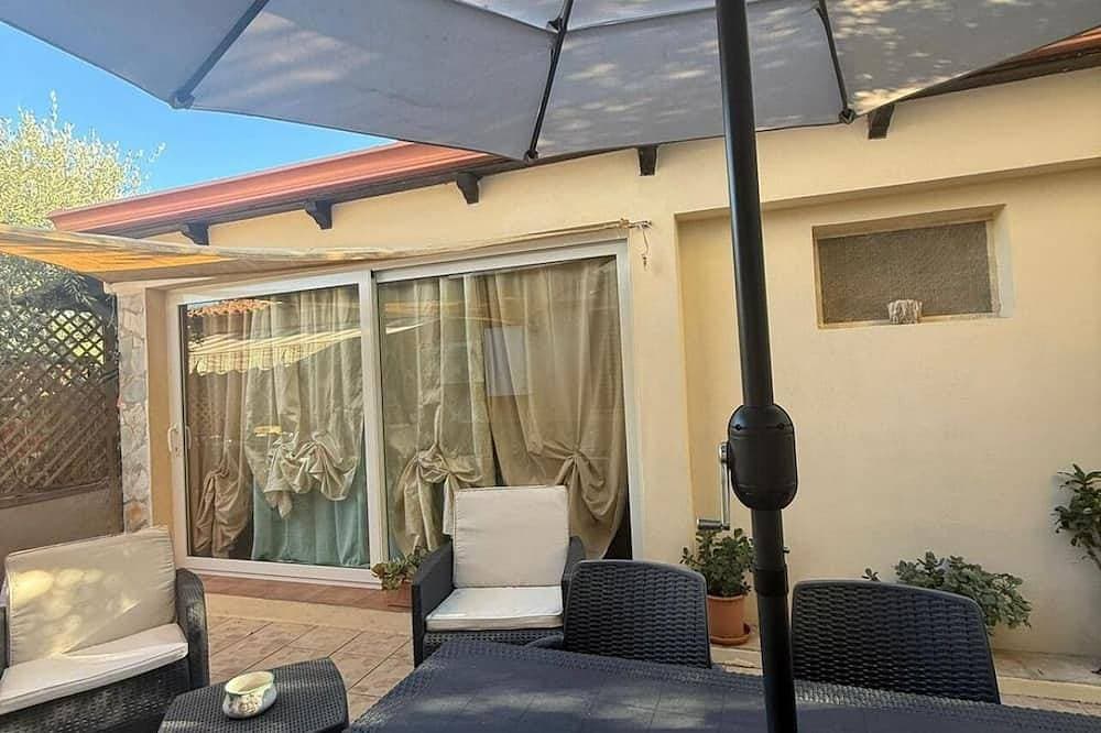 Room with private bathroom, patio. 1