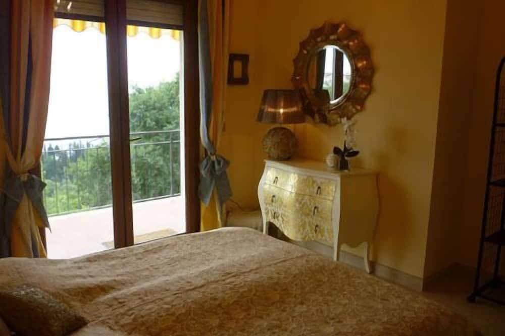 Foto 3 von 23: Wohnluxus auf 100m2 mit grandiosem Gardaseeblick - Golf-und Bikerparadies