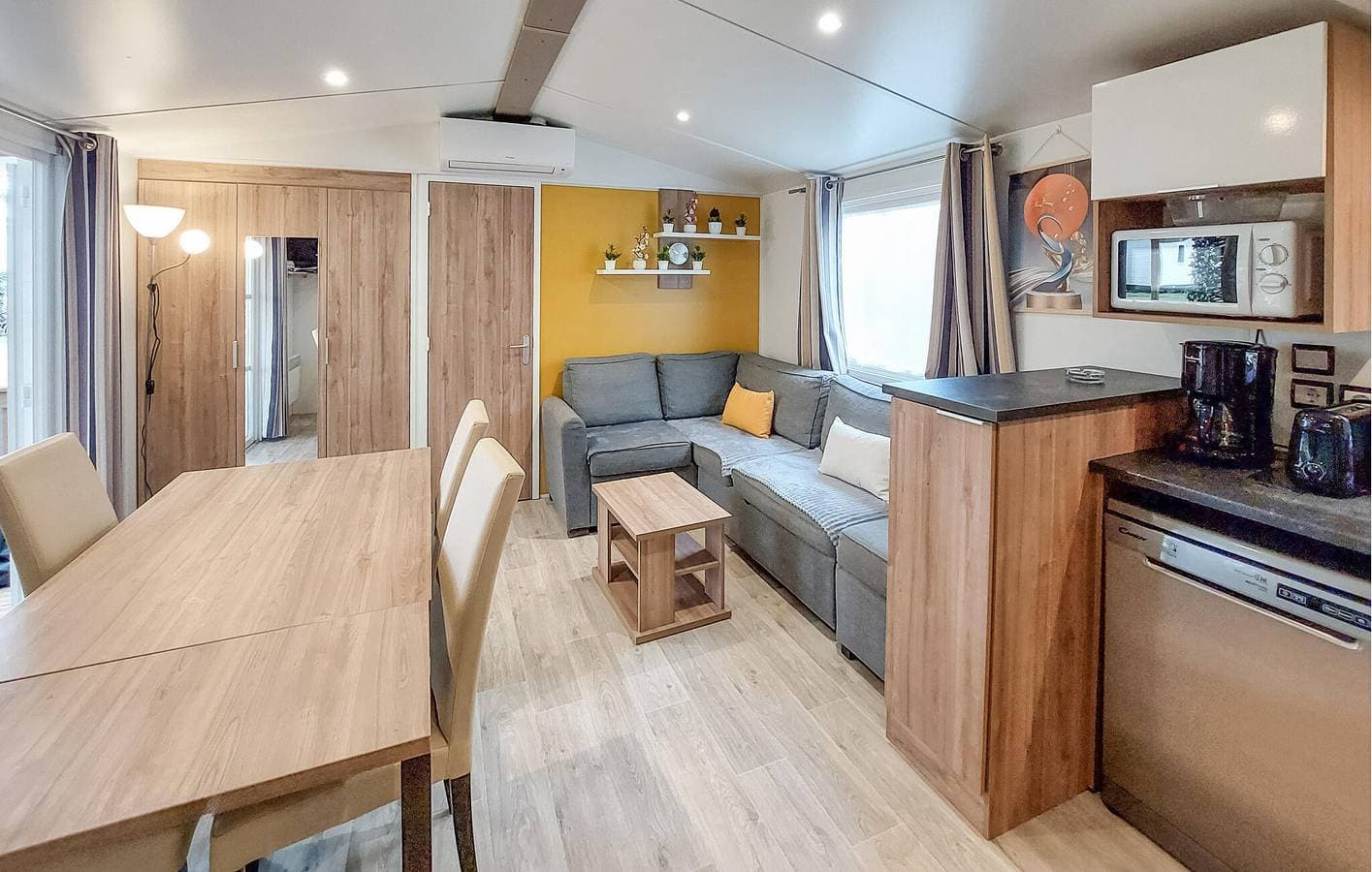 Foto 6 von 30: Gemütliches Mobilheim mit Parkplatz, WiFi, AC, Pool & Garten, Nähe Restaurant