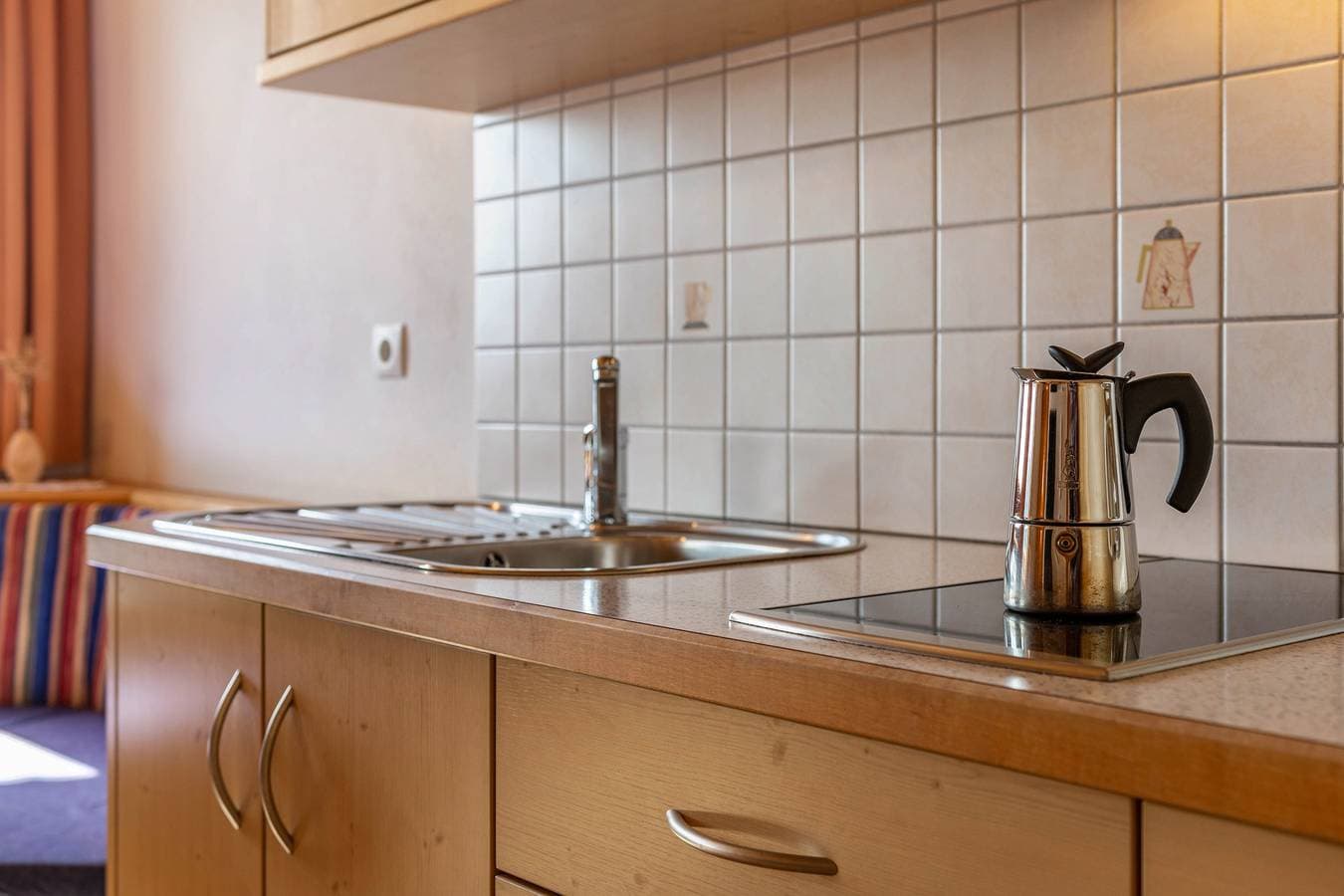 Foto 8 von 32: Ferienwohnung 'Haus Alpenblick Apt Brunelle' mit Bergblick, Gemeinschaftsgarten und WLAN
