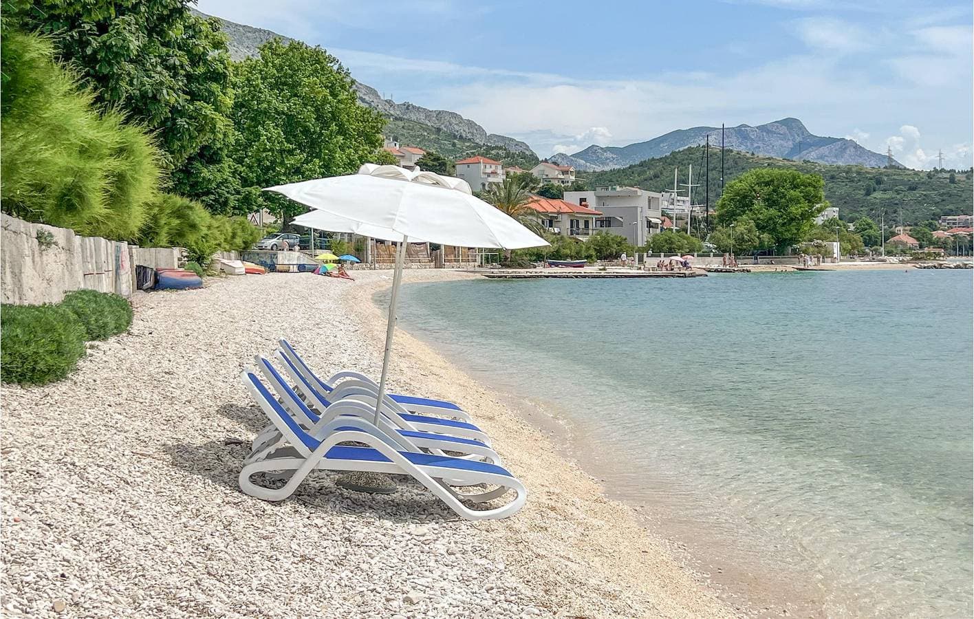Foto 13 von 26: Gemütliche 300 m zum Strand: Klimatisierte Wohnung mit Terrasse und Parkplatz