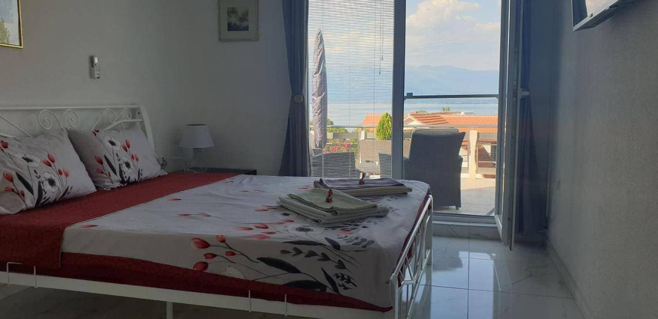 Foto 2 von 15: Quadruple Room with Lake View