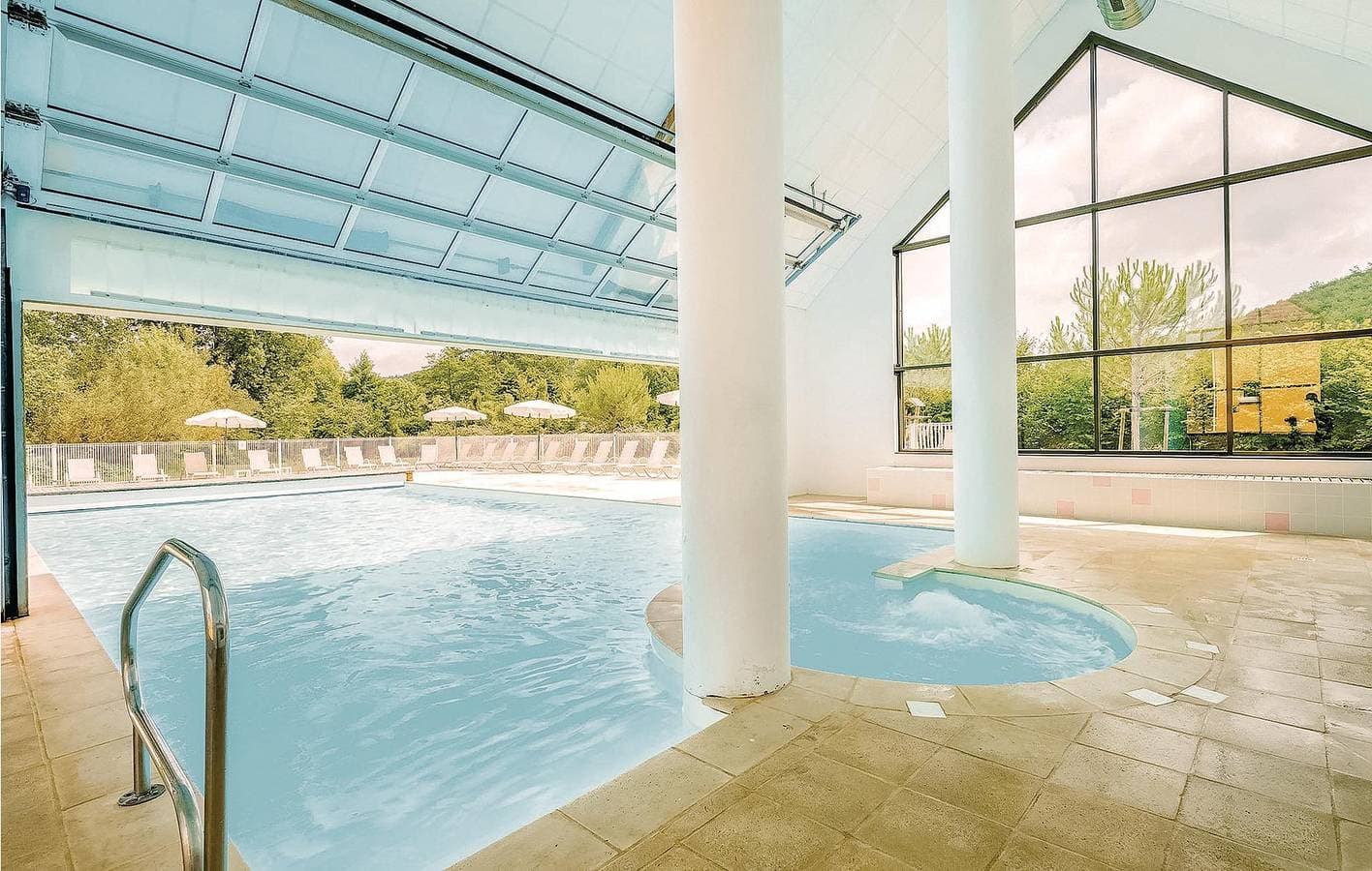 Foto 5 von 16: Terrassenwohnung mit Pool, Parkplatz & WiFi