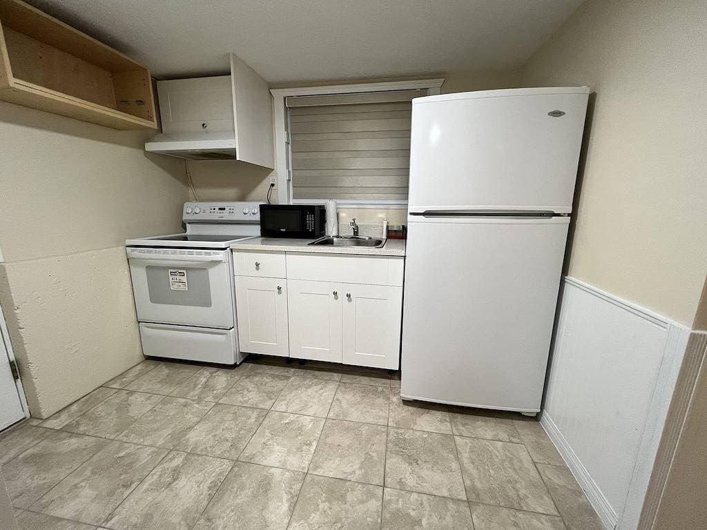 Foto 6 von 11: Bright1 Br suite w/ free parking & wifi & Netflix & all basic amenities