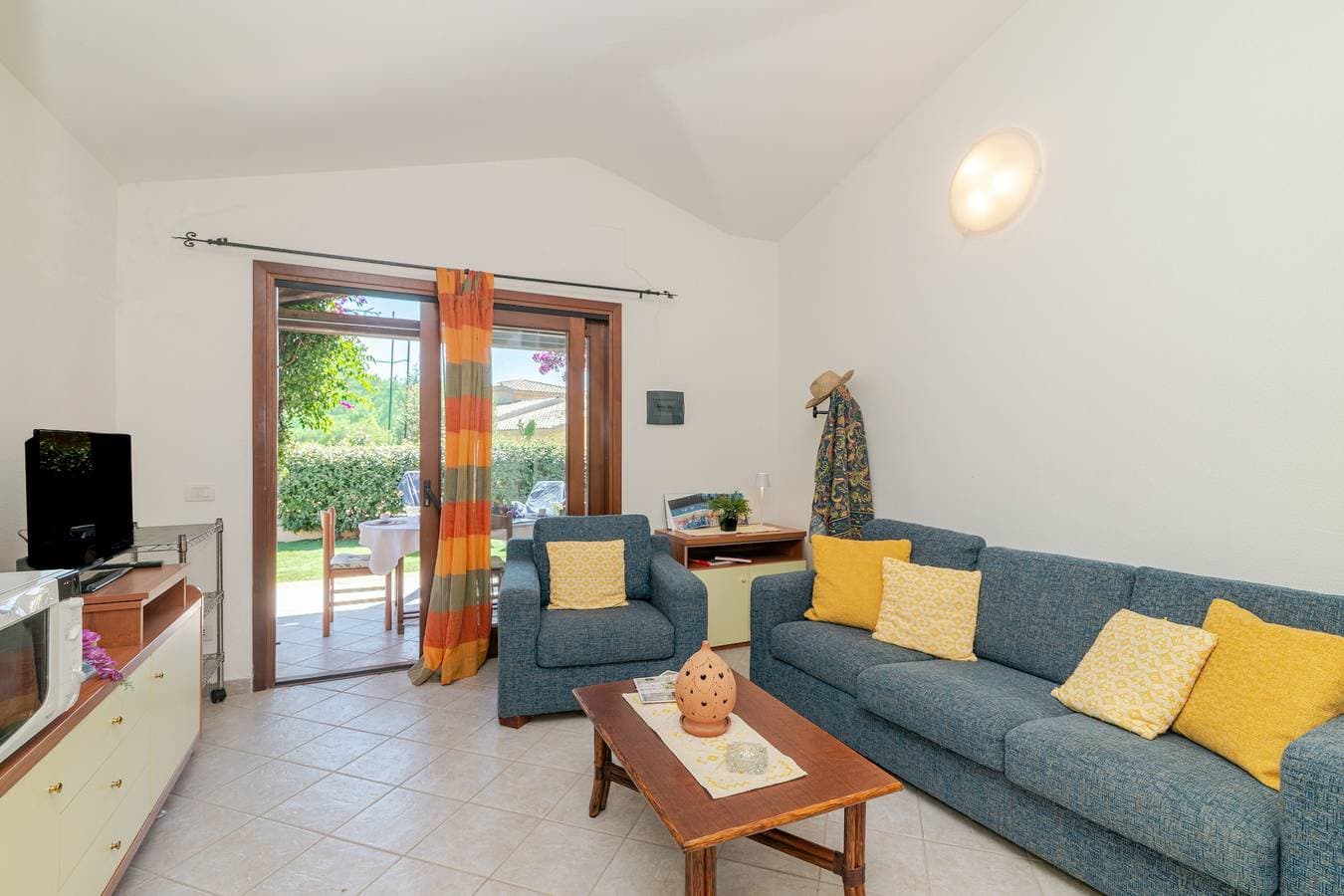 Foto 4 von 20: Villetta Girasole: Apartment mit privater Terrasse, Garten und Klimaanlage
