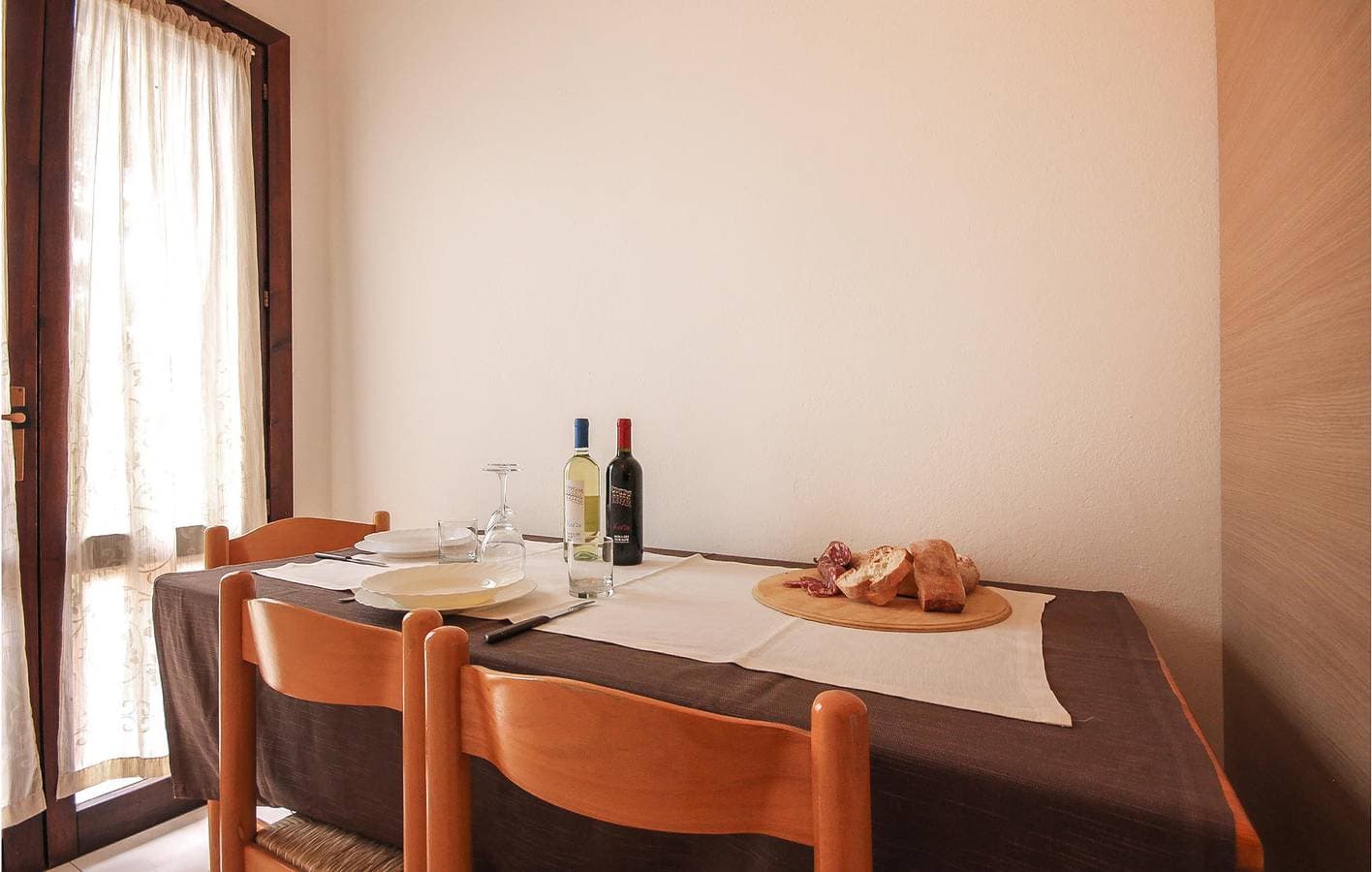 Foto 4 von 17: Costa Rei Coastal Apartment - WiFi, TV, Kaffee, Küche