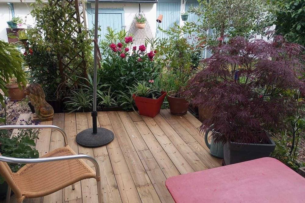 Foto 13 von 14: Le Poinçon Renversé : gemütlich und grün