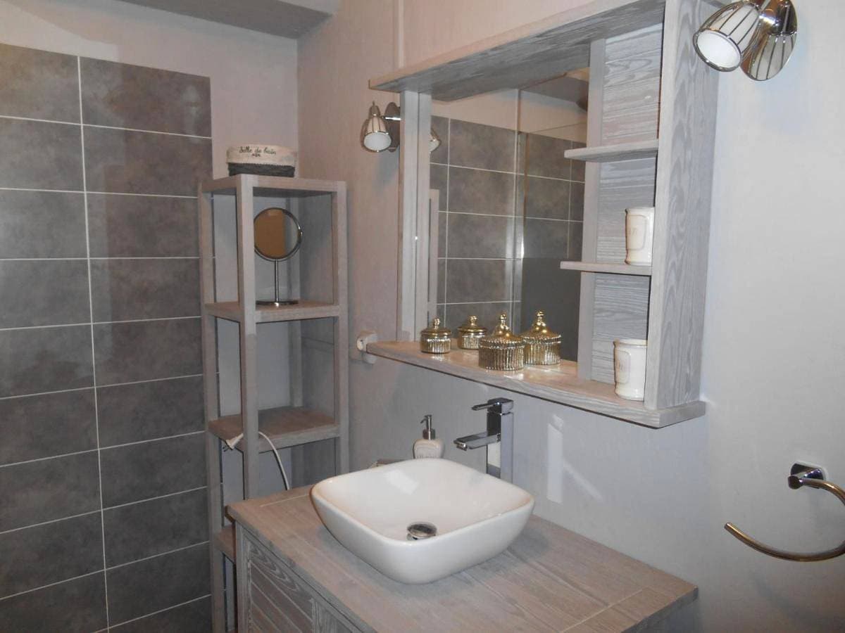Foto 4 von 16: Triple Room with Private Bathroom