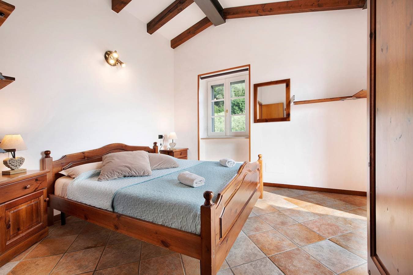Foto 11 von 28: Ferienhaus "Rustico Alle Fornare" mit Blick auf den See und die Berge
