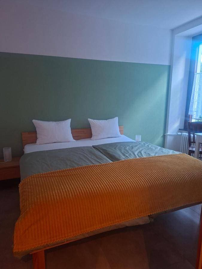 Foto 2 von 7: Double Room with Private Bathroom