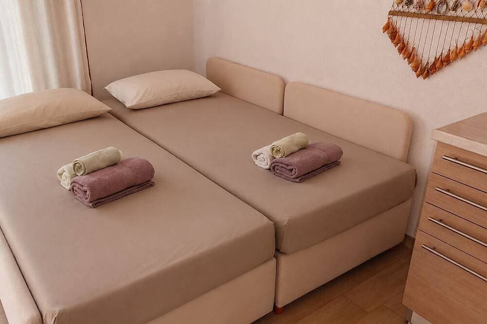 Foto 5 von 30: Apartment with Private Garden and Patio - Relaxation and Comfort Two Steps from the Sea