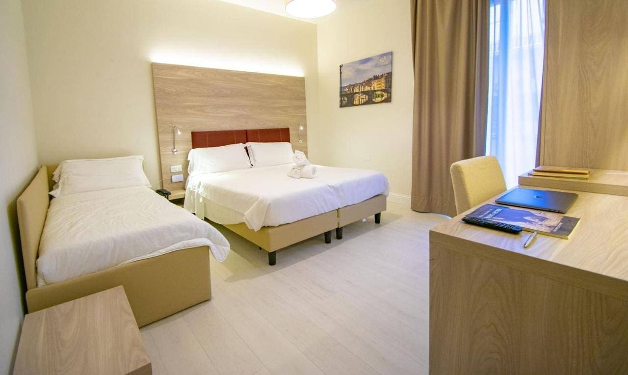Foto 4 von 16: Triple Room