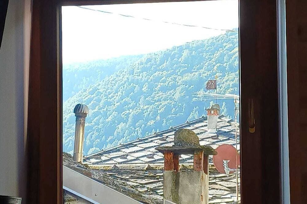 Foto 12 von 14: Charming mountain apartment ideal for couples. Nature and relaxation.