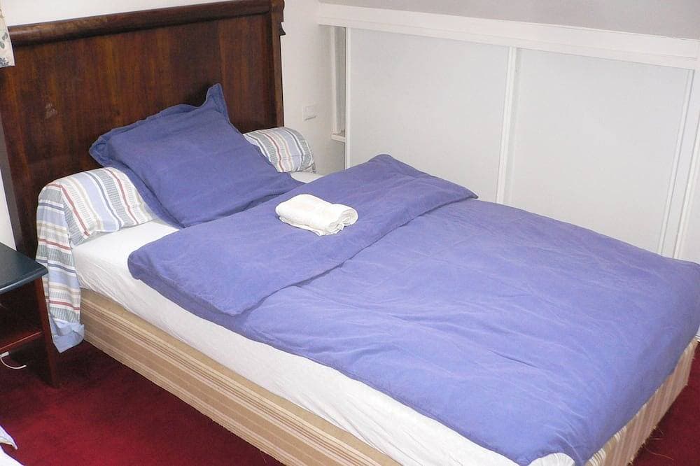 Foto 10 von 25: Große freistehende komfortable Zimmer