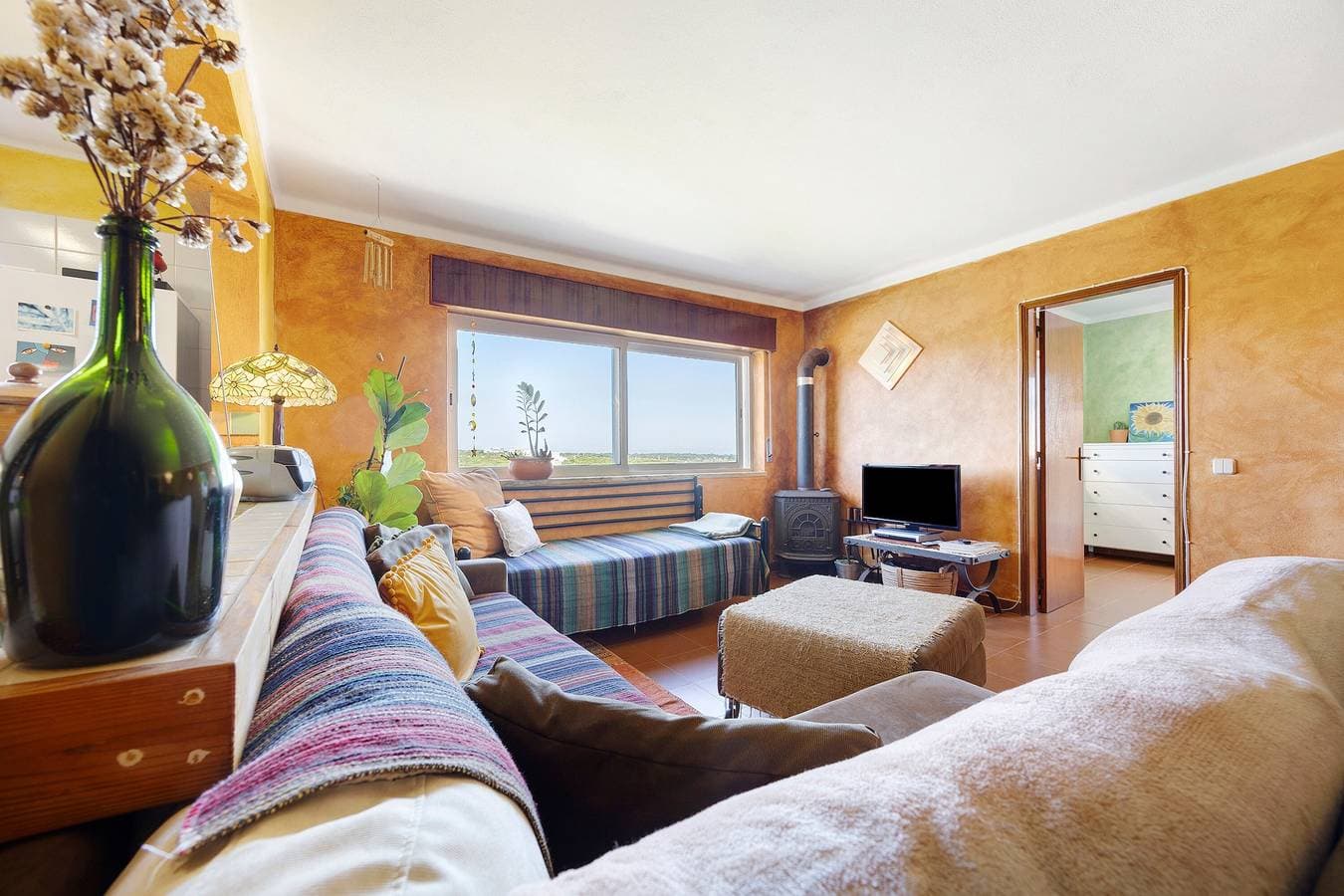 Foto 2 von 22: Ferienhaus 'Surf Spot' mit Bergblick, Gemeinschaftsterrasse und Balkon