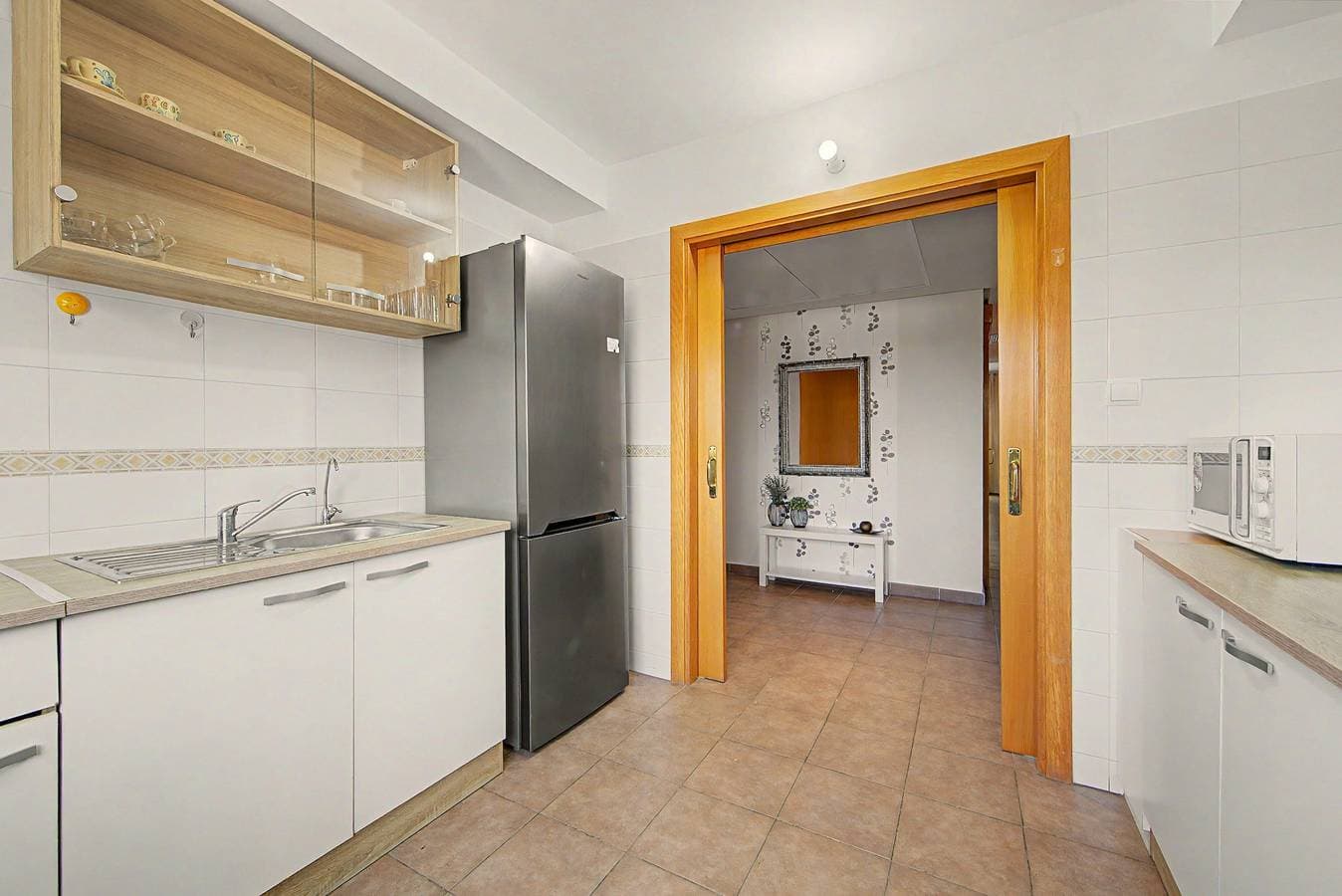 Foto 10 von 32: Apartment „Ático Vacacional“ mit Gemeinschaftspool, Balkon und Klimaanlage