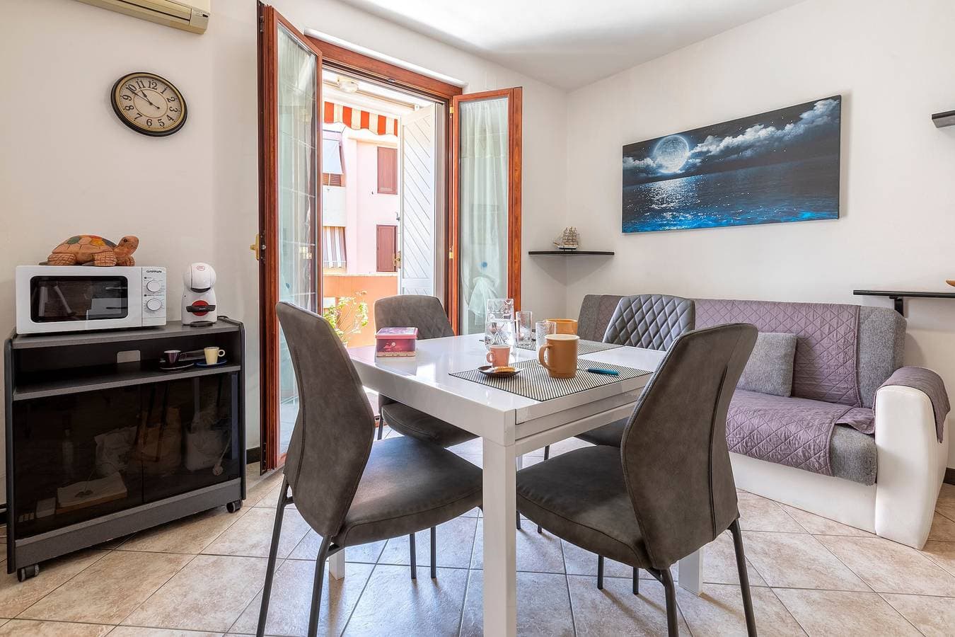 Foto 4 von 20: Ferienhaus 'Casa 'Sole Del Lido'' mit Balkon und Klimaanlage