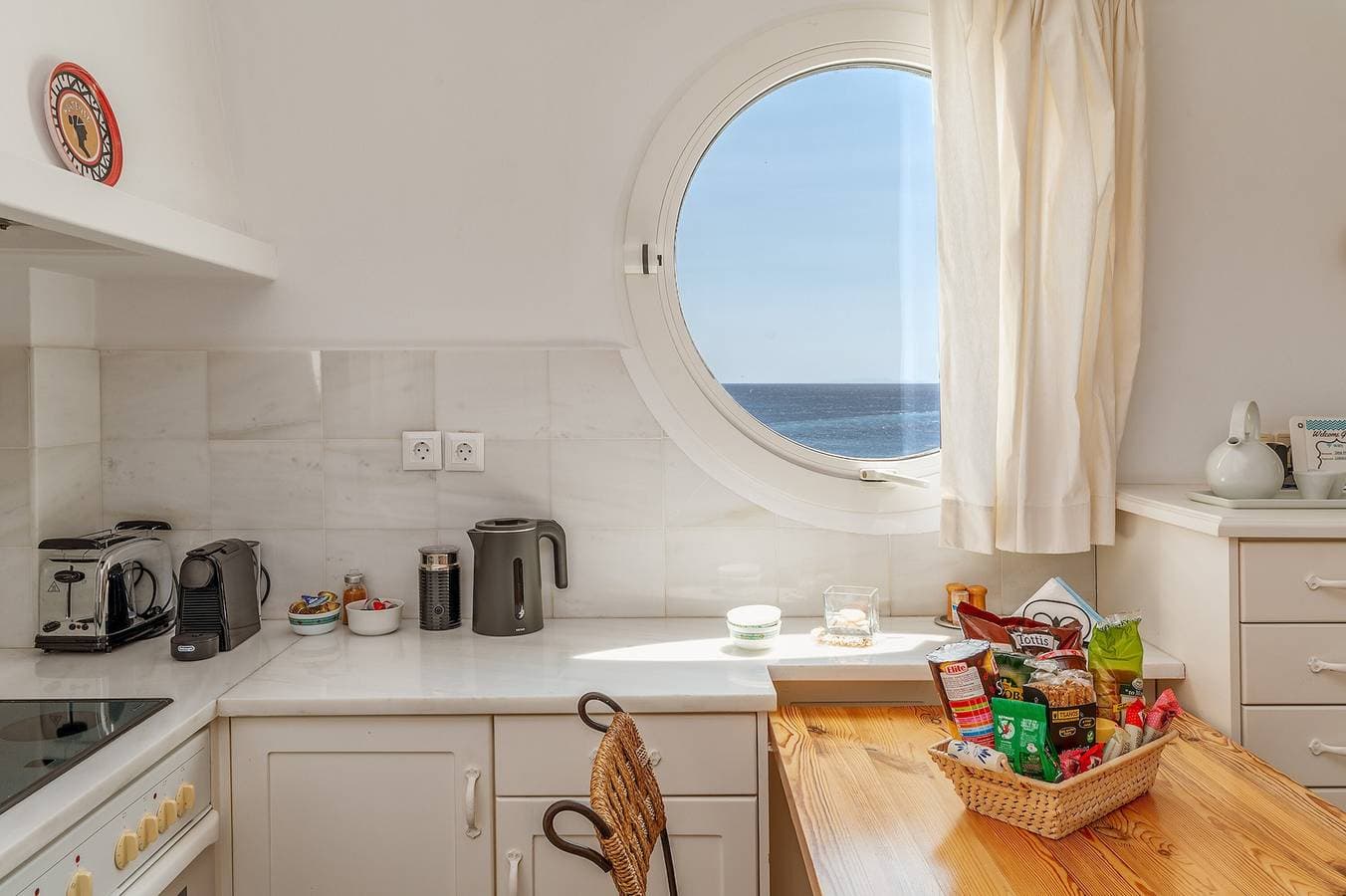 Foto 9 von 25: Ferienwohnung 'Seepferdchen 2 Tinos' mit Meerblick, WLAN und Klimaanlage