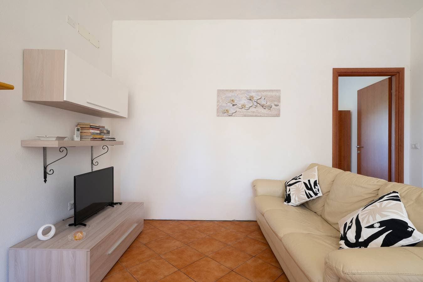 Foto 4 von 26: Apartment 'Casa delle Mimose vicino al mare' mit Garten, WLAN & Klimaanlage