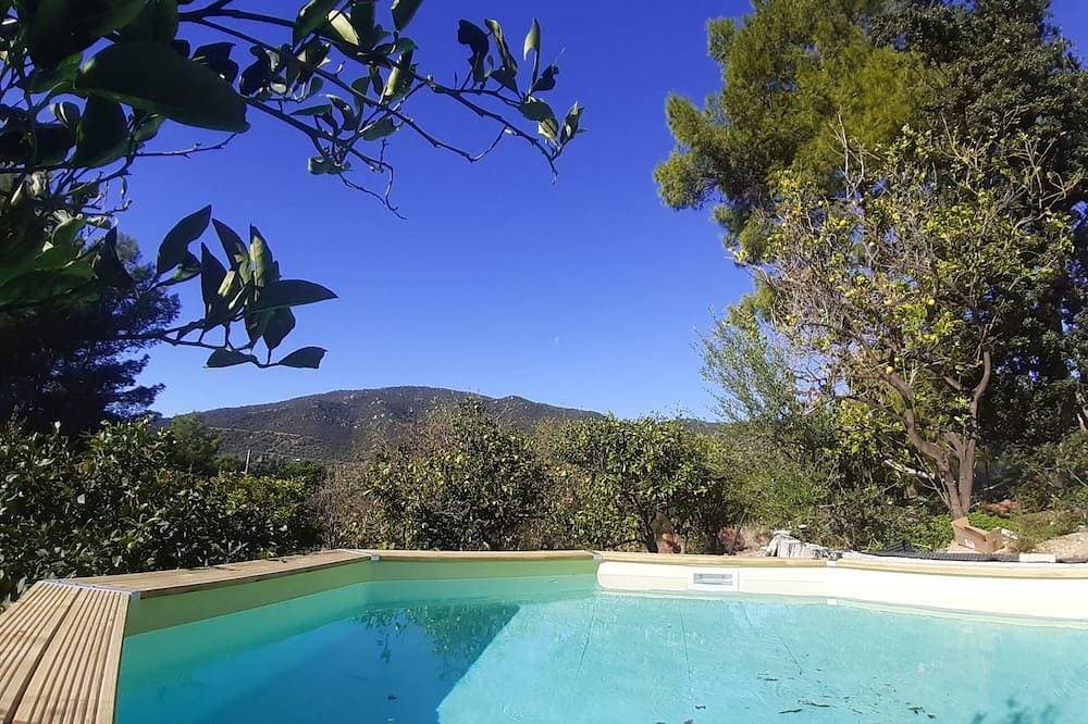 Comfortable country house with garden and private pool, 4km from Solanas beach. 1