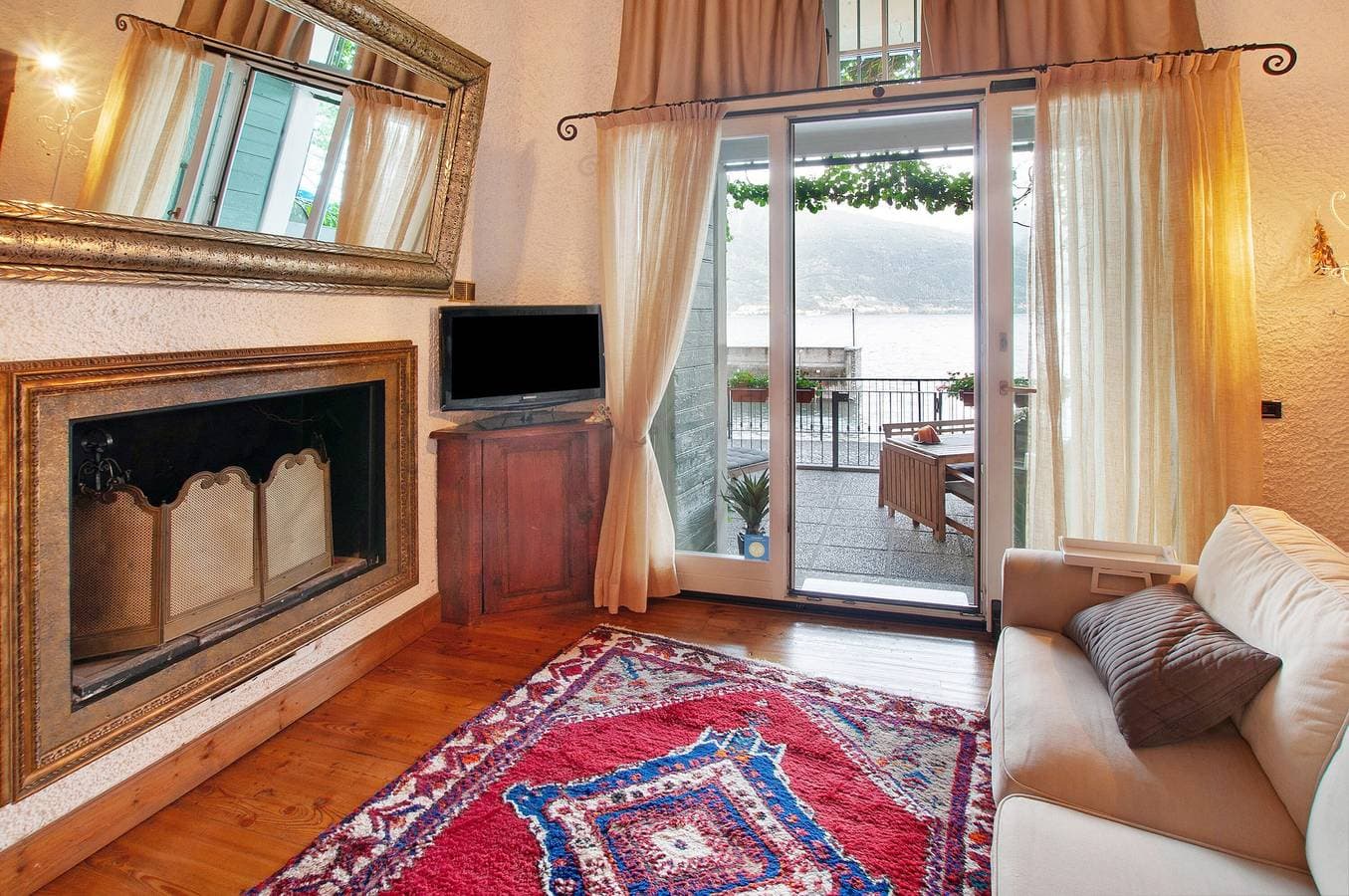 Foto 4 von 21: Ferienwohnung 'Casa Al Molo' mit Seeblick, Garten und WLAN
