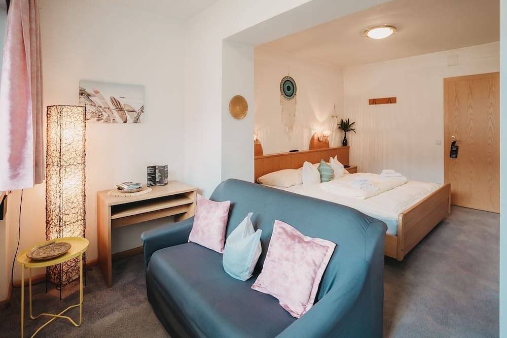 Foto 3 von 21: Zimmer „Garni Unterweggütl Karibik“ mit Bergblick, Gemeinschaftspool und WLAN