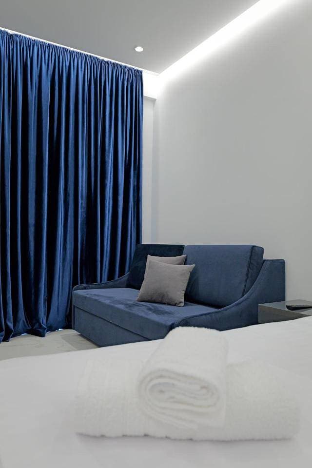 Foto 10 von 29: Deluxe Triple Room with Sea View