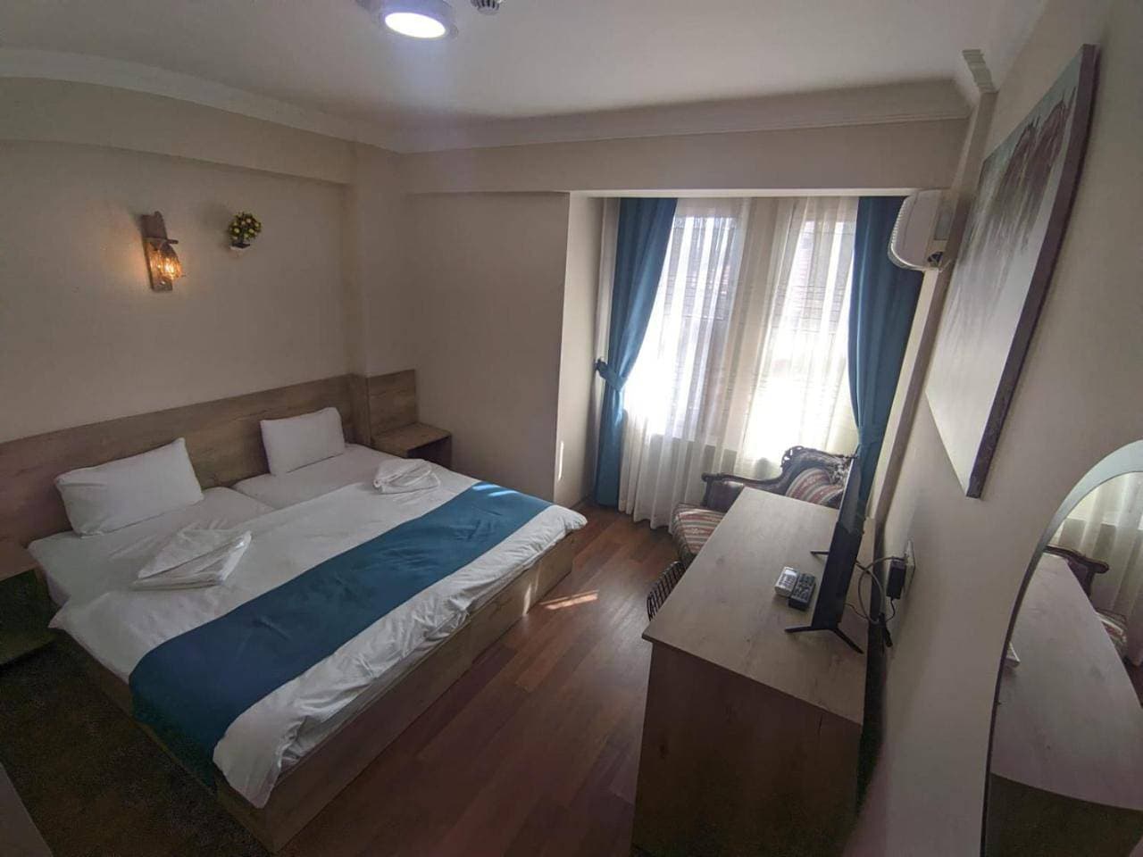 Foto 13 von 19: Deluxe Double Room with Side Sea View