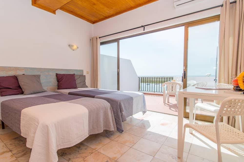 Foto 3 von 30: Studio Apartment with Sea View