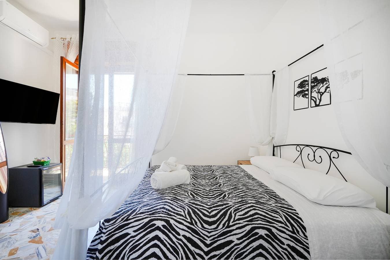 Foto 8 von 22: Zimmer 'Casa Merlino - Matrimoniale' mit Balkon, WLAN und Klimaanlage