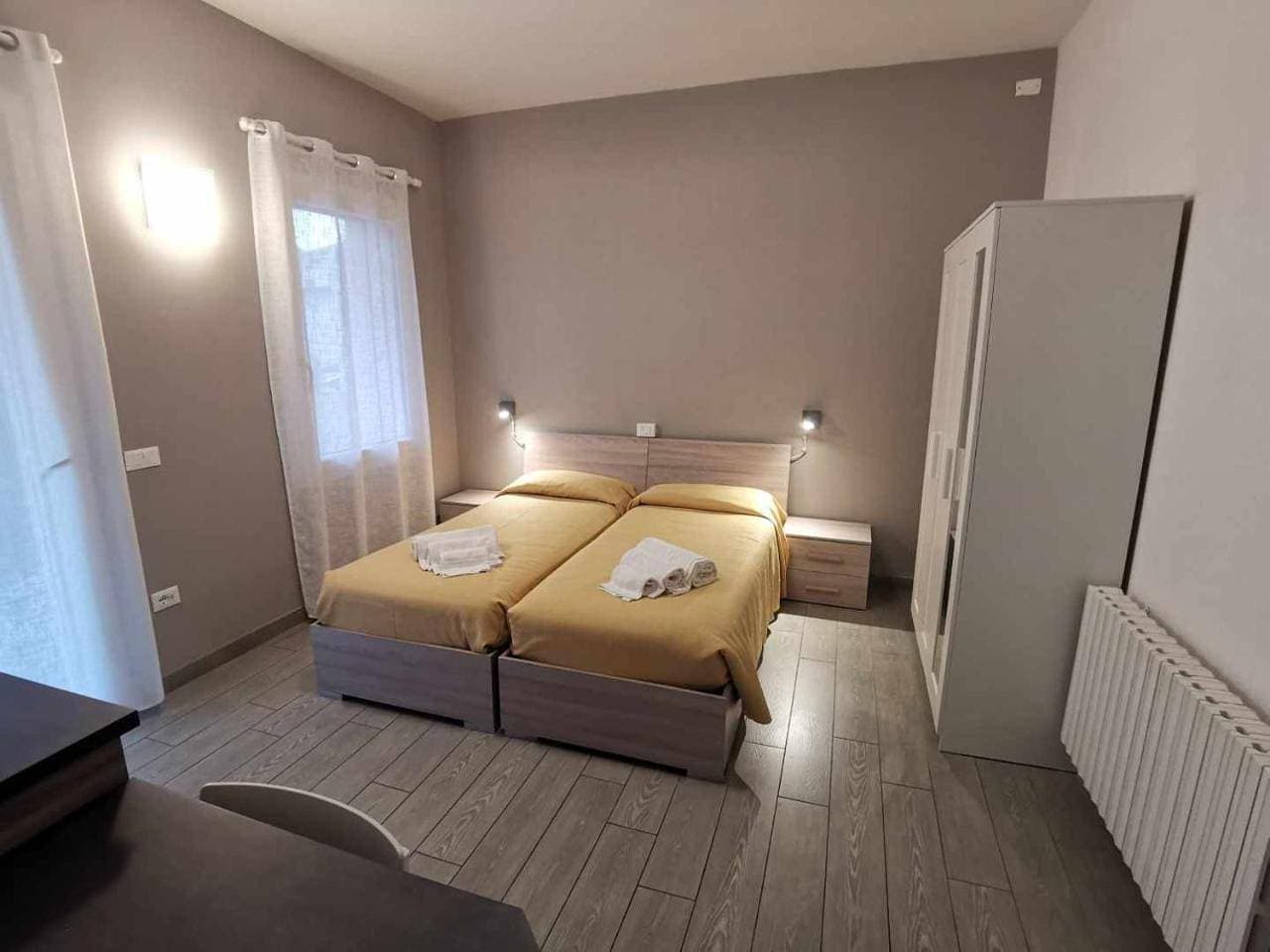 Foto 10 von 25: Twin Room with Private Bathroom