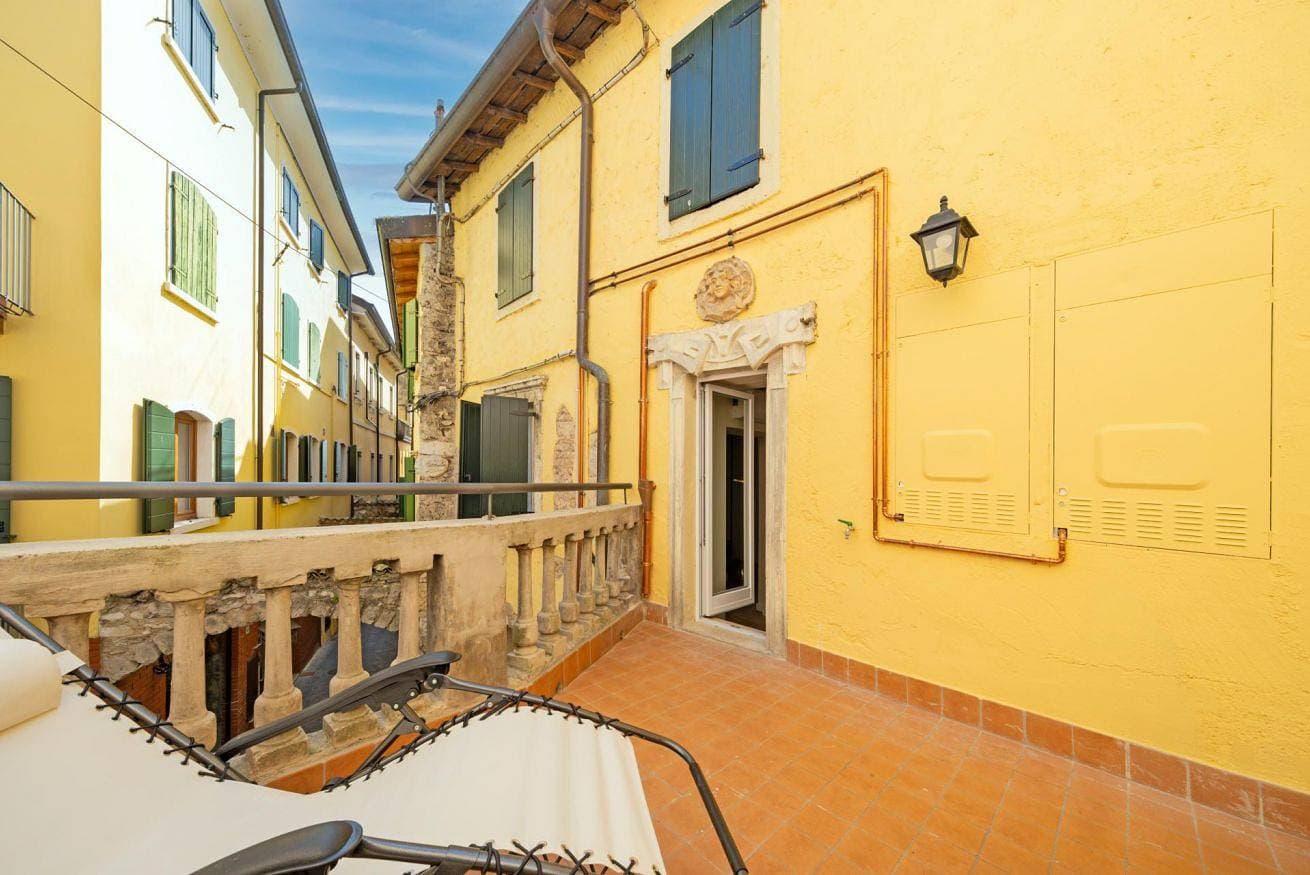 Foto 3 von 12: ApartmentsGarda - Loggia Libertà