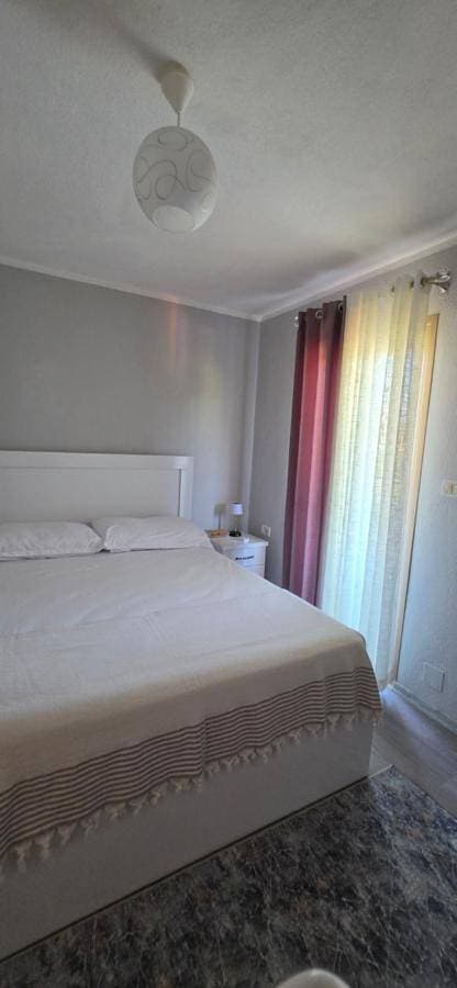 Foto 2 von 11: Double Room with Shared Bathroom