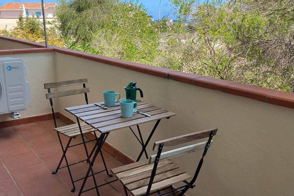 Foto 11 von 11: Emerald Apartment. A few steps from the sea