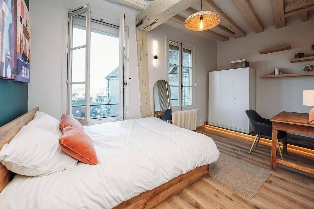 Foto 2 von 17: Charming urban retreat with city views