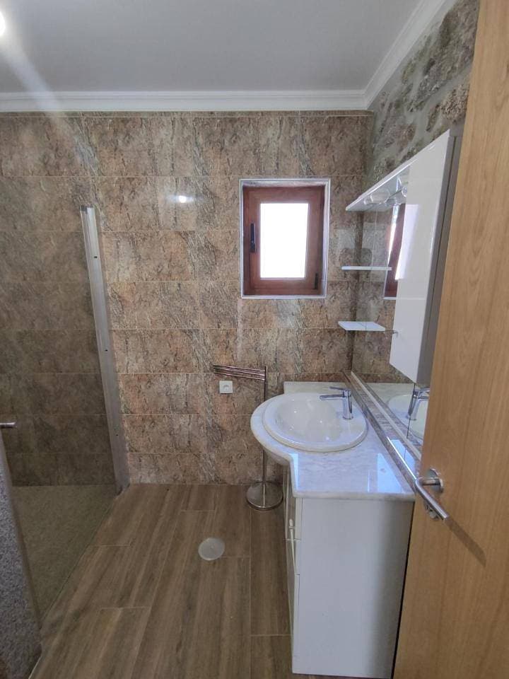 Foto 11 von 26: Three-Bedroom House