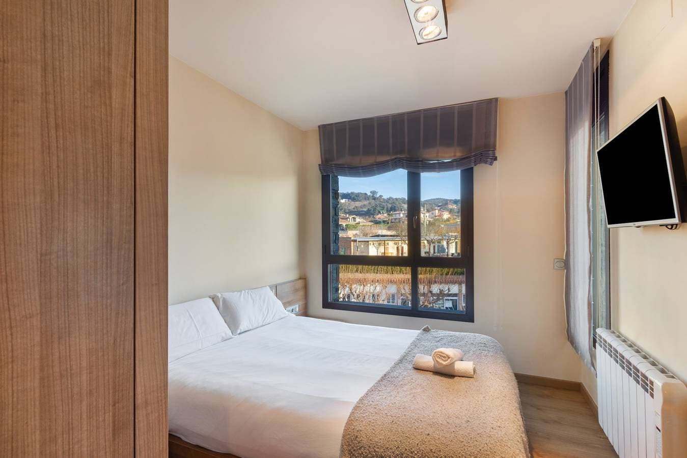 Foto 10 von 25: Ferienwohnung 'Niu Turístic Olvan' mit Bergblick, Balkon und Klimaanlage