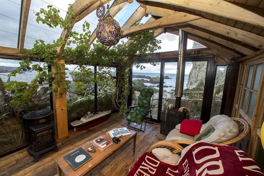Foto 6 von 30: Schönes Ferienhaus direkt am Meer, weitläufige private Gärten, atemberaubender Meerblick.