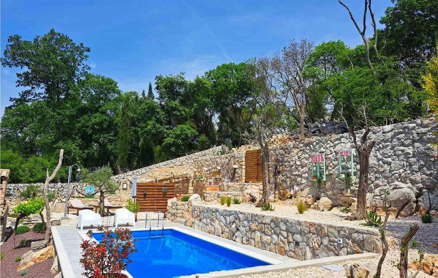 Foto 5 von 37: Gemütliche Ferienwohnung mit Pool, Terrasse und WLAN – nur 300 m von der Küste entfernt!