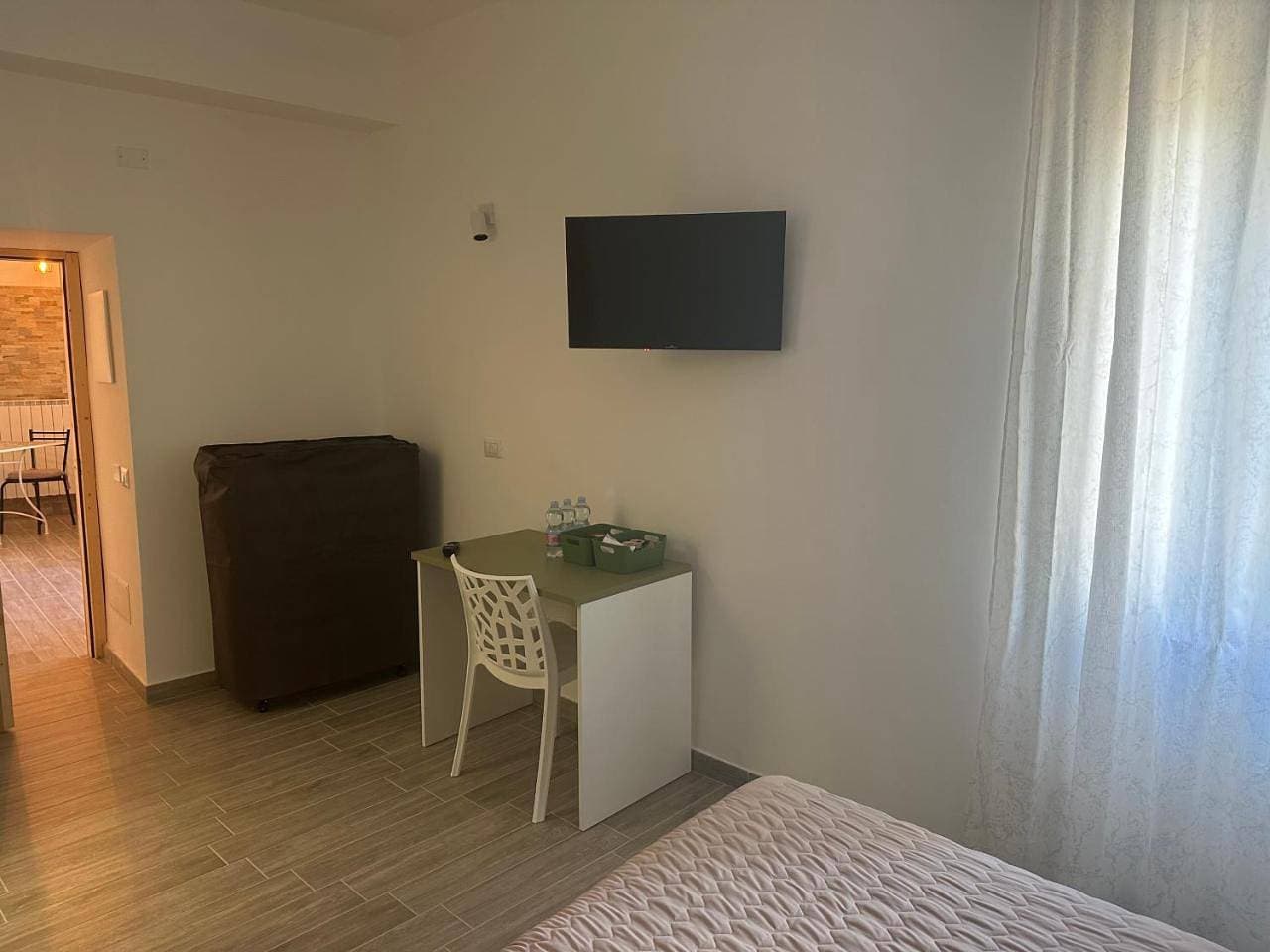 Foto 13 von 13: Triple Room with Private Bathroom