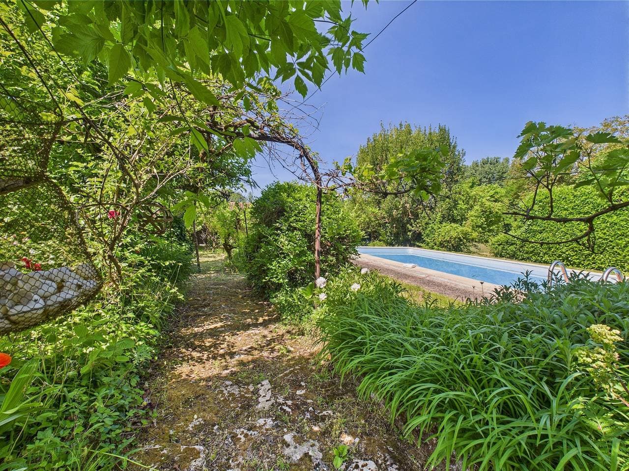 Foto 7 von 32: Gîte mitoyen, 4 adultes 1 enfant, piscine commune