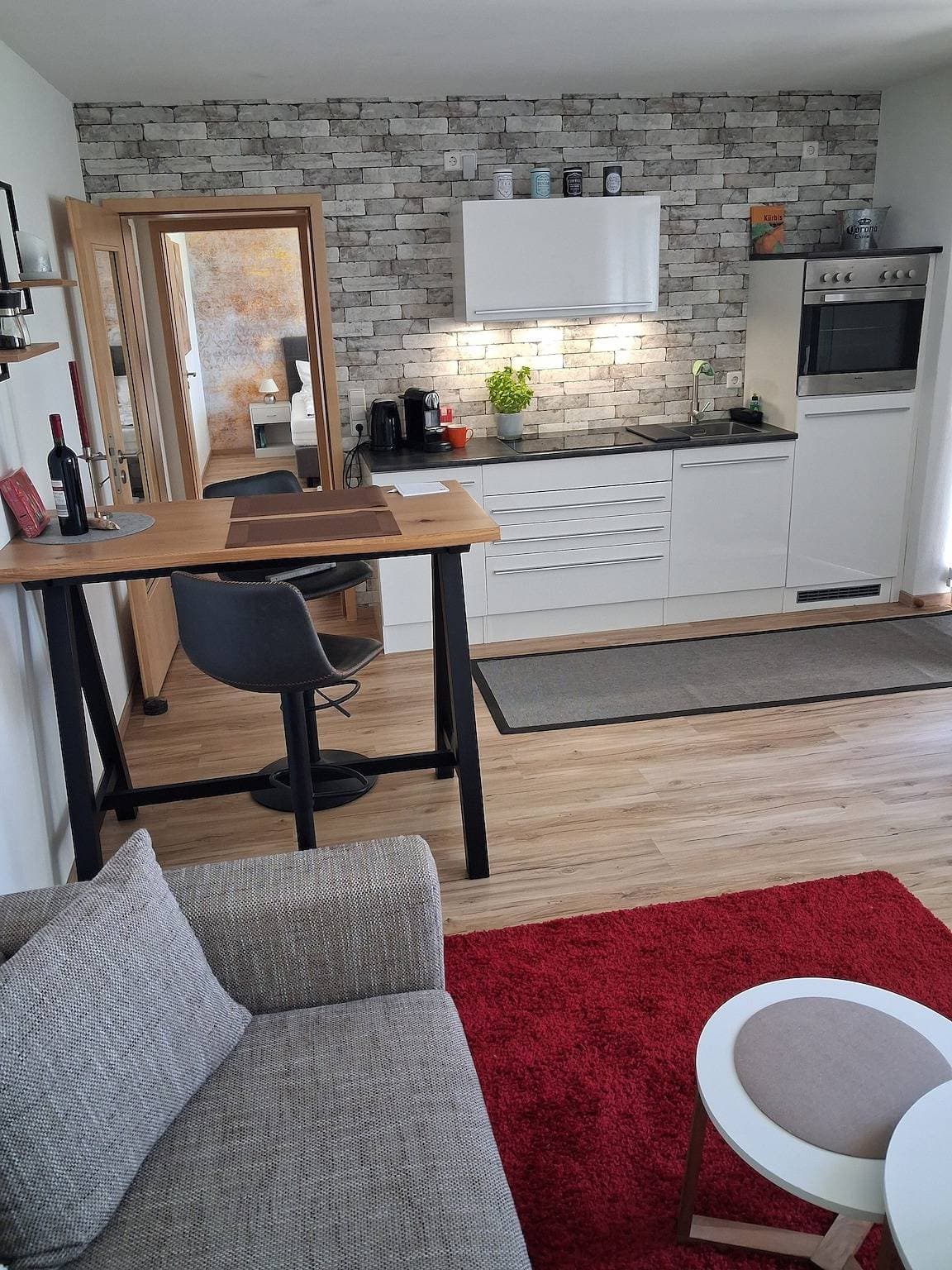 Foto 12 von 23: Ferienwohnung 'Lounge' mit Bergblick, privater Terrasse und Wi-Fi