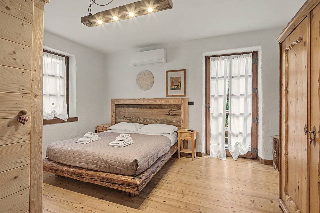 Foto 3 von 39: Zimmer „Camera Genziana“ mit Bergblick, WLAN und Klimaanlage