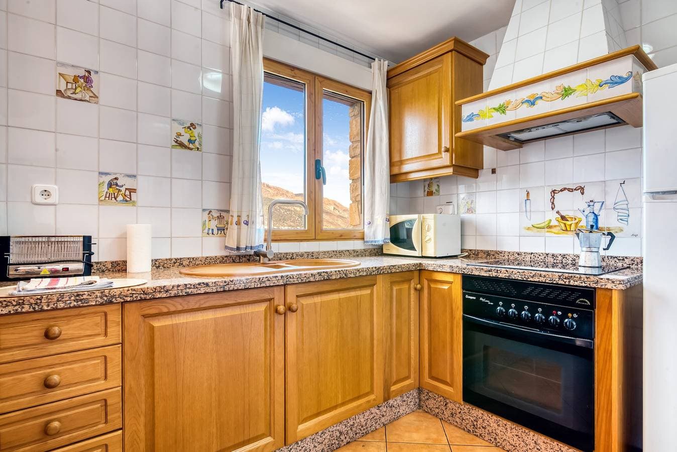 Foto 9 von 31: Ferienwohnung 'El Castellet' mit Bergblick, Wi-Fi und Klimaanlage