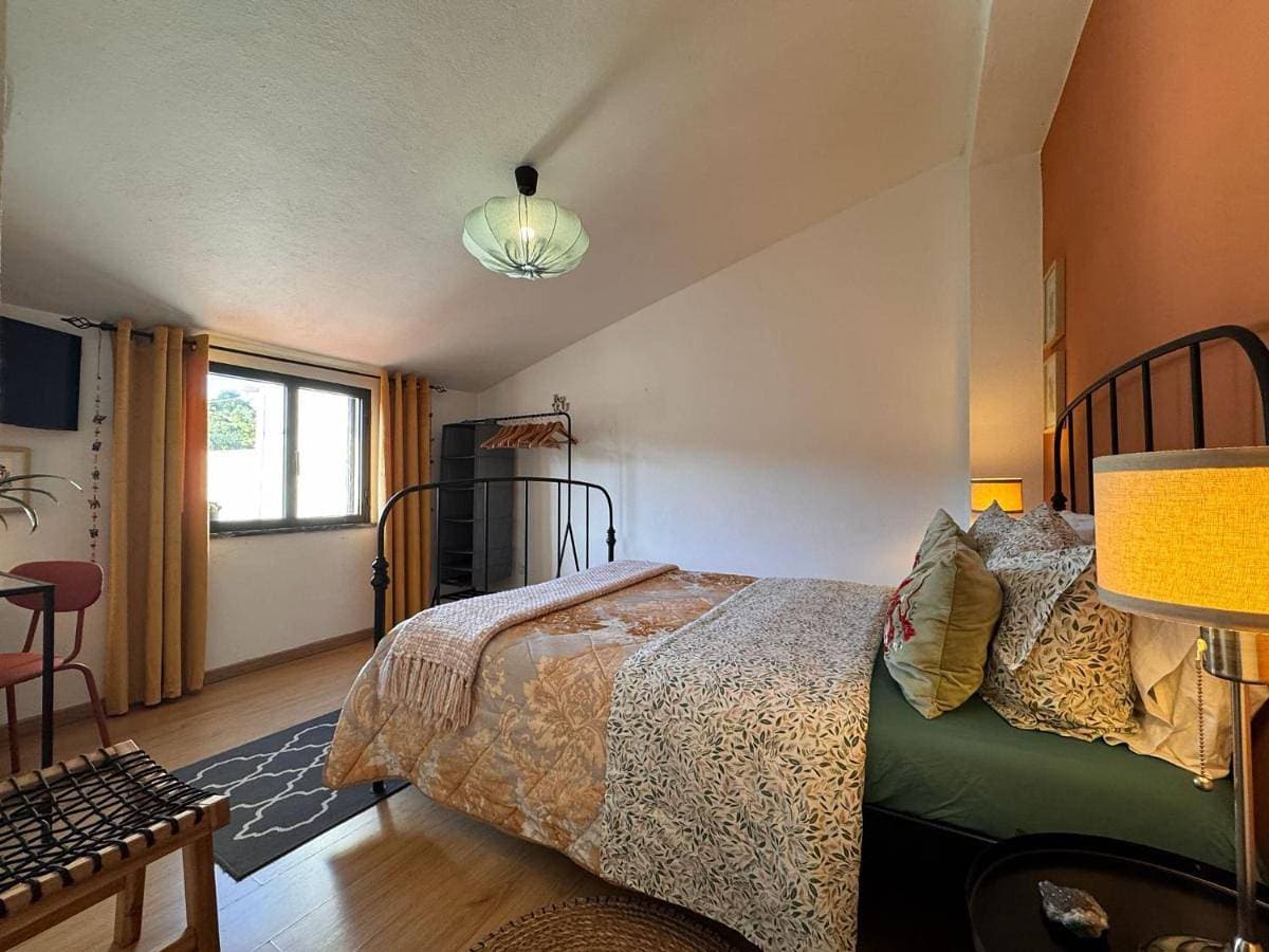 Foto 4 von 43: Double Room with Shared Bathroom