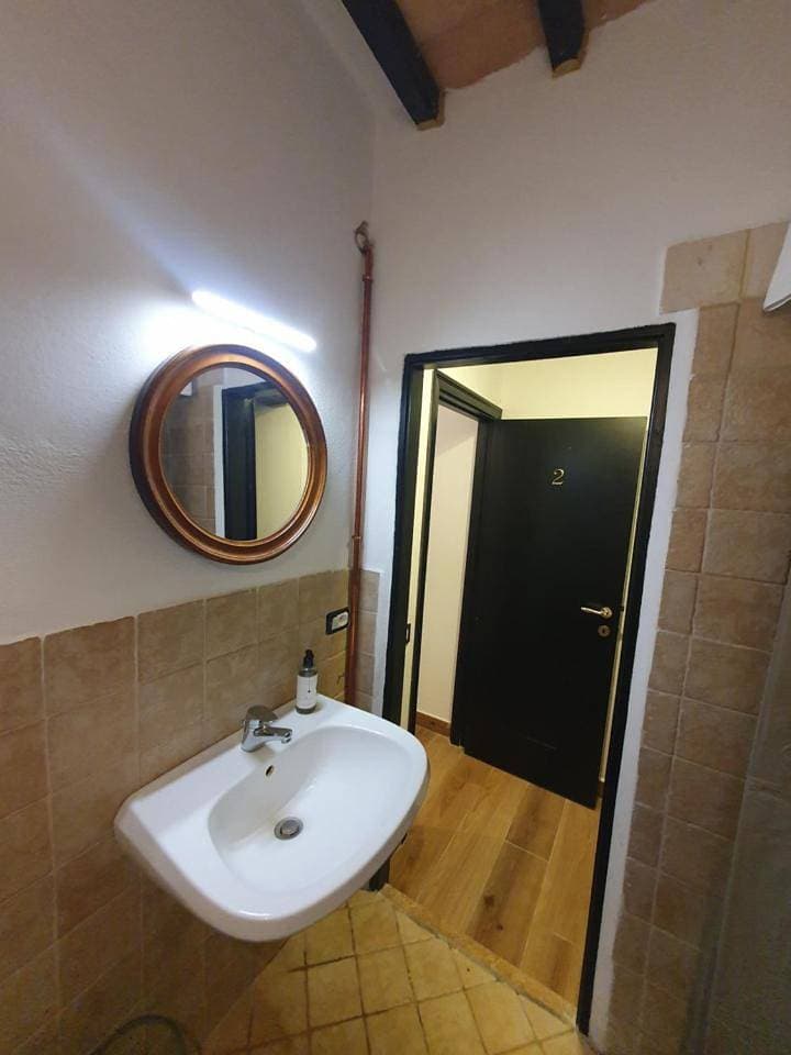 Foto 10 von 11: Double Room with Private Bathroom