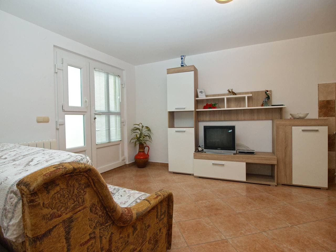 Foto 4 von 24: Ferienwohnung für 5 Personen mit Terrasse