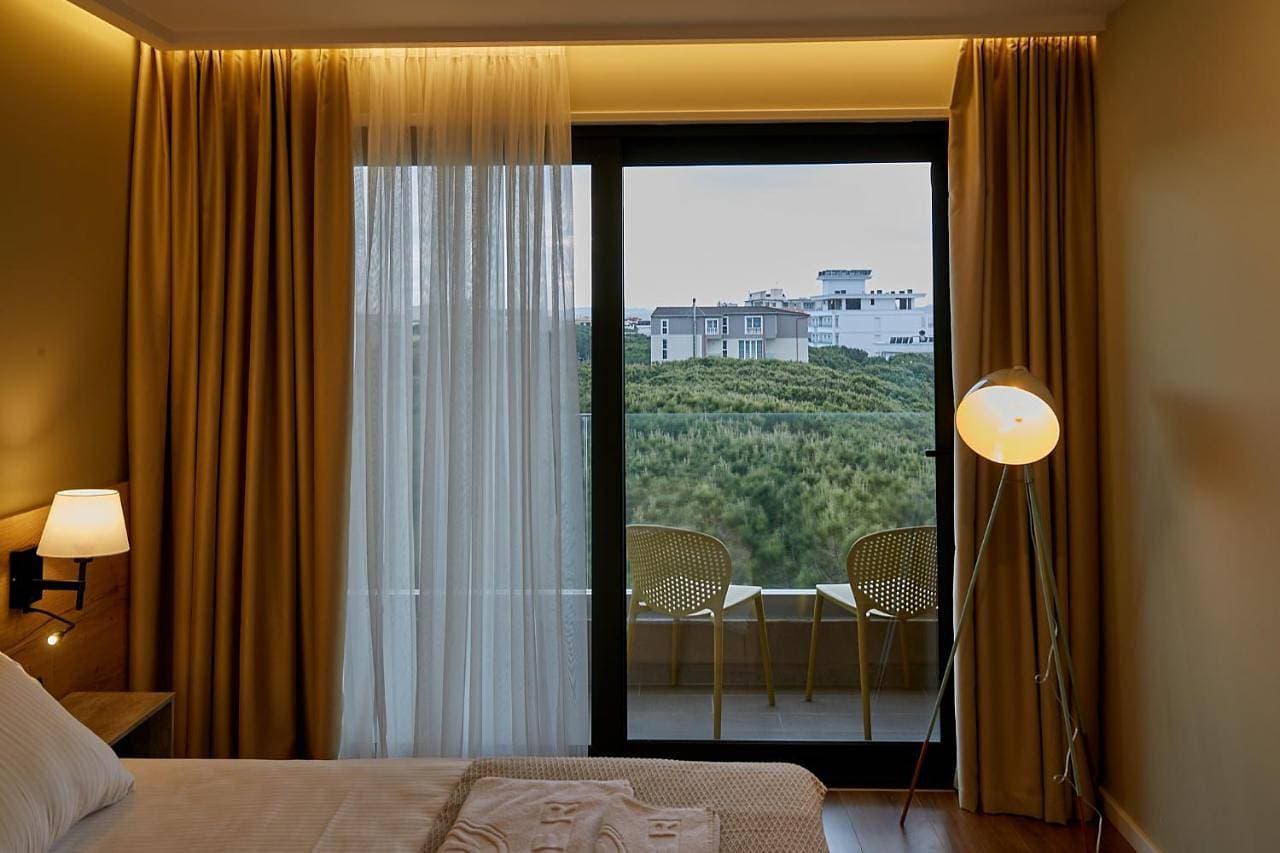 Foto 10 von 11: Standard Double Room with Side Sea View