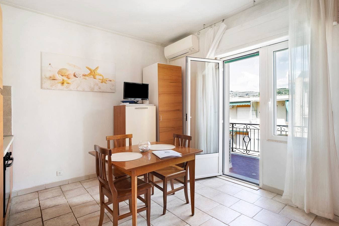 Foto 7 von 23: Einzimmerapartment "Urlaub am Meer" mit Terrasse & A/C