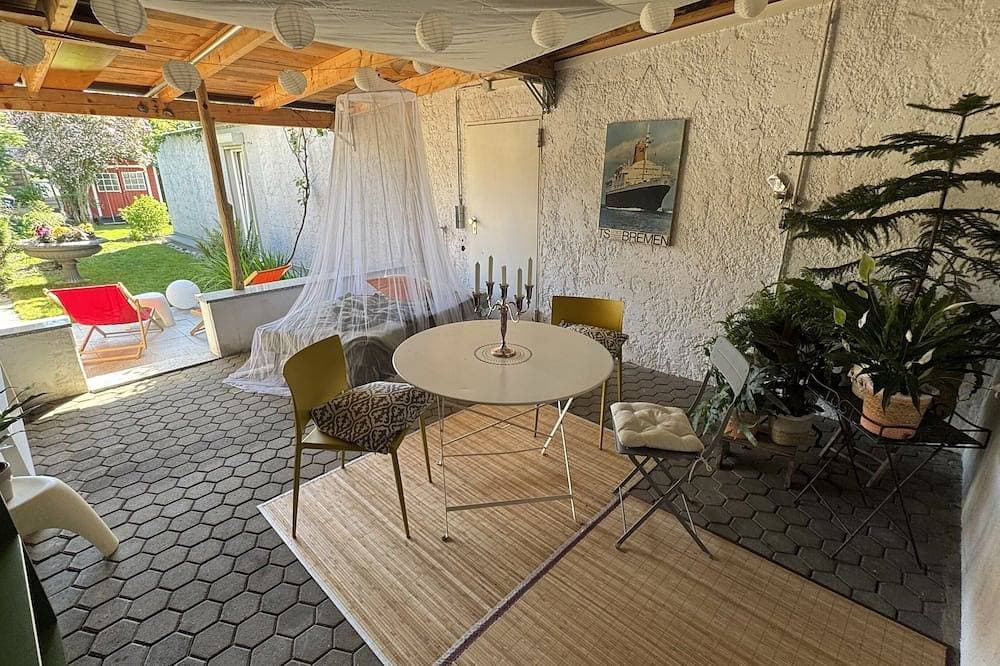 Foto 11 von 12: Apartment 'Klein Aber Fein' mit privater Terrasse, Gemeinschaftsgarten und WLAN